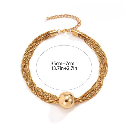 Goldkette mit poliertem Kugelanhänger